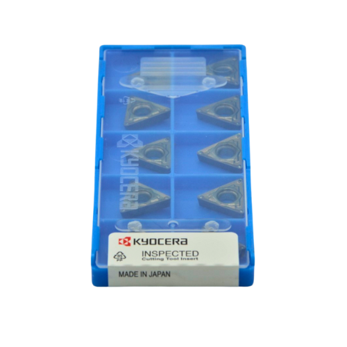 Packaged cutting tool inserts with Kyocera branding on a white background